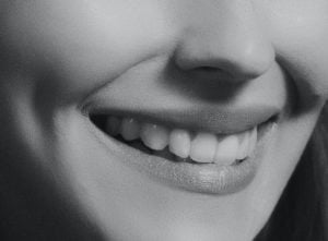 Black and white photo of a beautiful smile Dr Joseph Dentistry